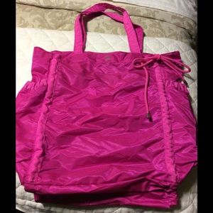 Hot pink yoga bag.