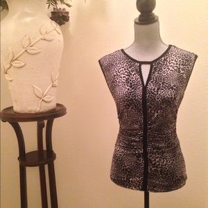 Short sleeve top. Figure hugging.