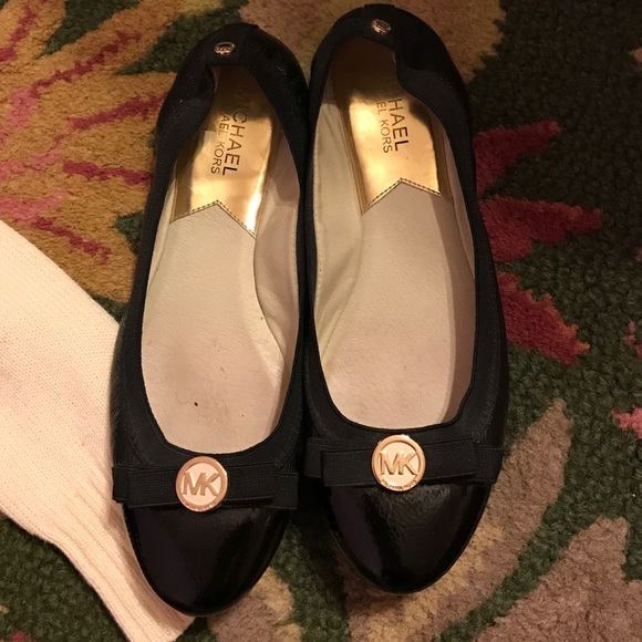 Black leather MK flats with bow detail