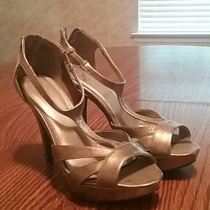 Heels, never worn, really a pewter color