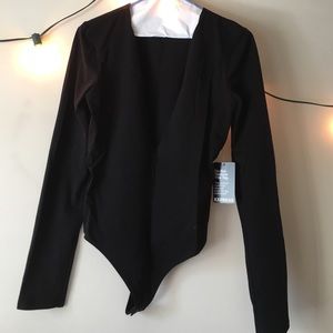 Body suit plunging V neck