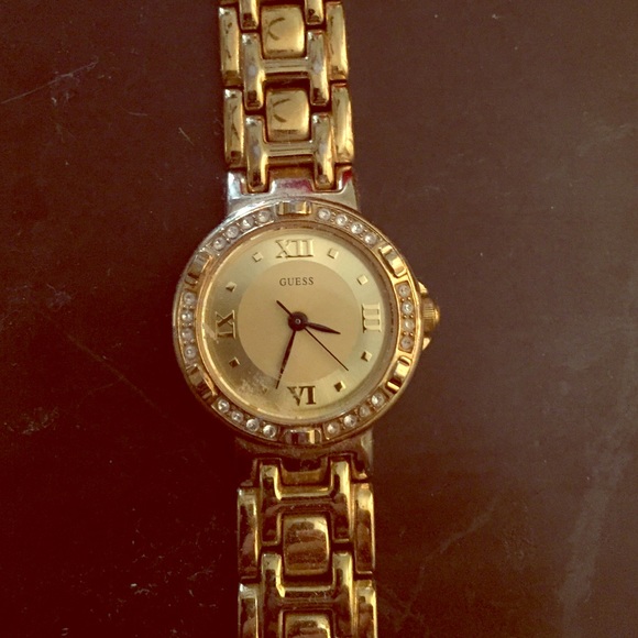 Used gold guess watch