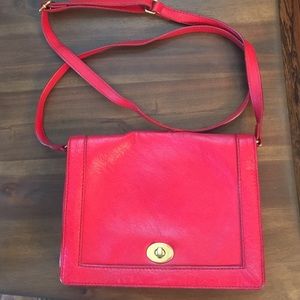 Red/orange-ish jcrew purse doubles as a clutch