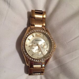 Gold fossil watch