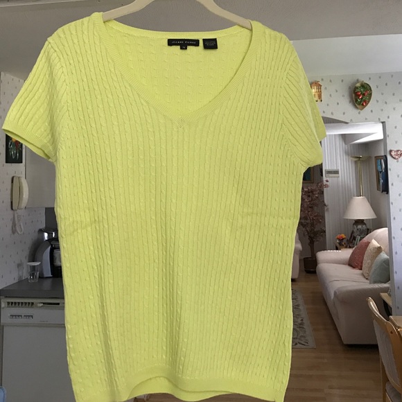 Jeanne Pierre green shirt