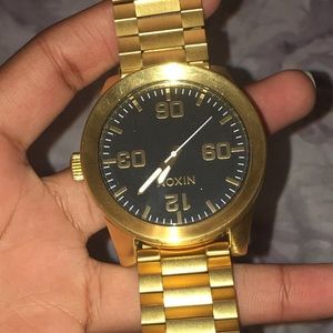 Nixon gold stainless Steel watch