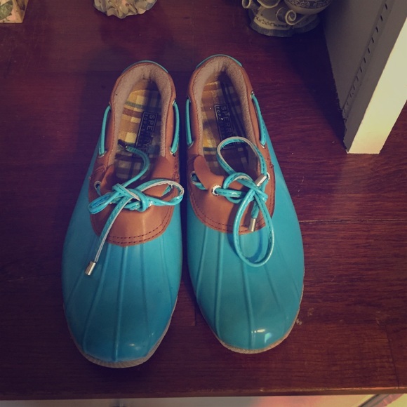 Sperry rain boots.