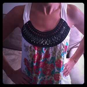 White tank top w/ colorful flowers & black weaving