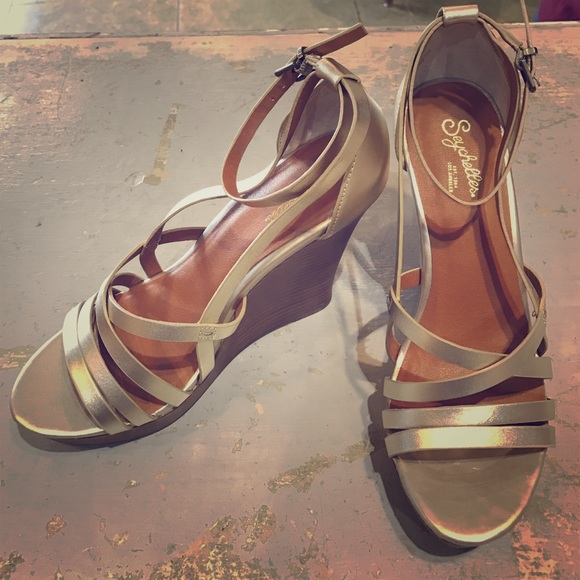 Gorgeous leather strapping wedge.