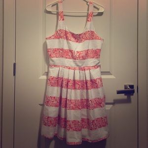 Cute sleeveless orange & white, lace dress.