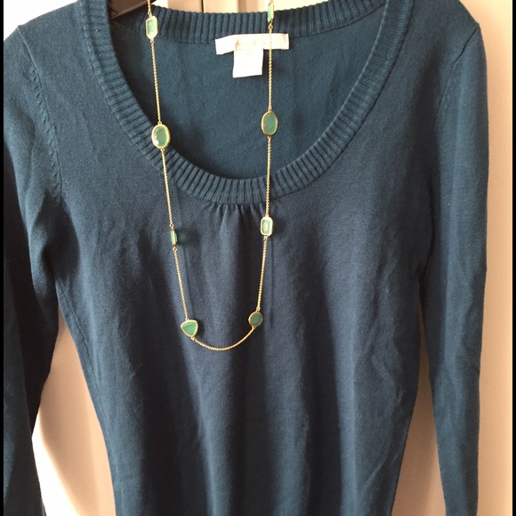 Teal sweater.