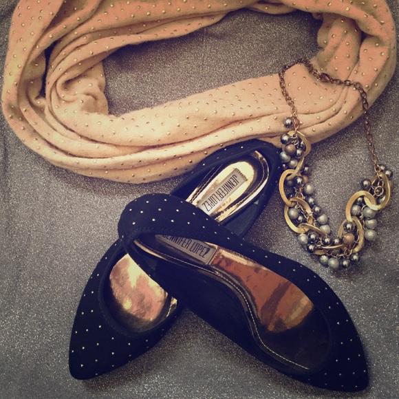 Black flats with gold embellishments