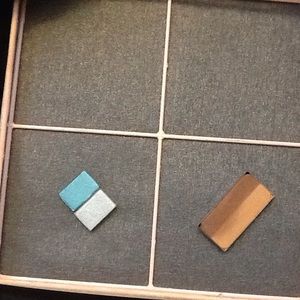 Two eye shadows and bronzer