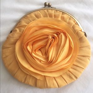 Golden floral clutch.