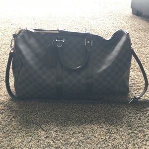 Louis Vuitton medium size duffle bag