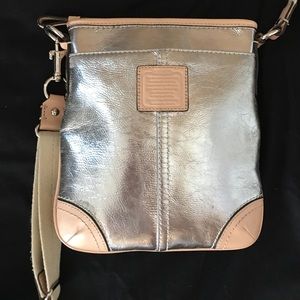 A CrossBody Coach Purse well condition!