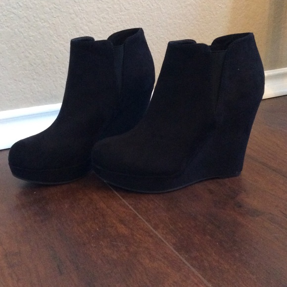 Black wedge booties