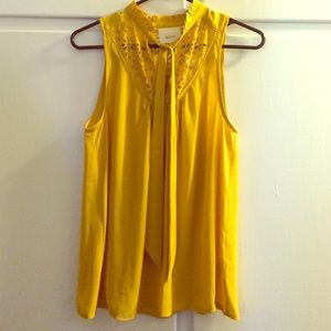 Mustard yellow tank.