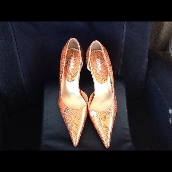 Orange and black pumps