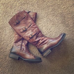 Soft leather knee high boots.