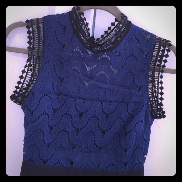 Blue lace open back dress.