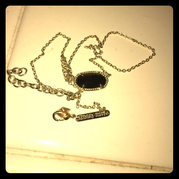 Kendra Scott Elisa gold pendant necklace is black