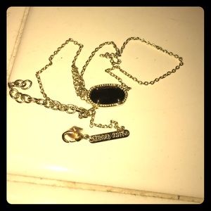 Kendra Scott Elisa gold pendant necklace is black