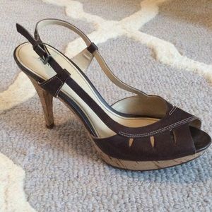 Cute and comfy brown heels with cork heel.