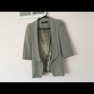 Pastel green blazer- very flaterring