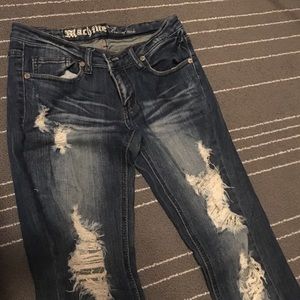 Destroyed crop jeans
