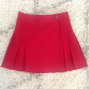 Red pleated skirt
