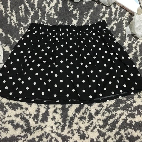 Black skirt with white polka dots
