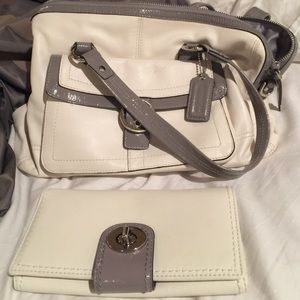 A gray and white wallet and purse together