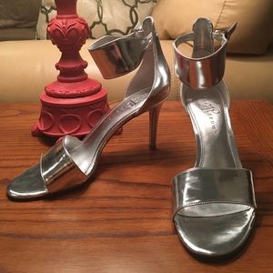 Metallic silver heels by Ivanka Trump