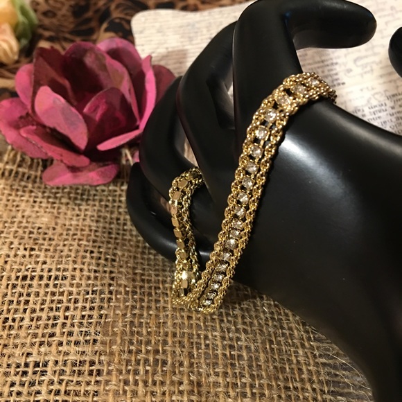 Tennis bracelet. Gold tone with CZ