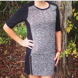 Tweed dress with leather sleeves