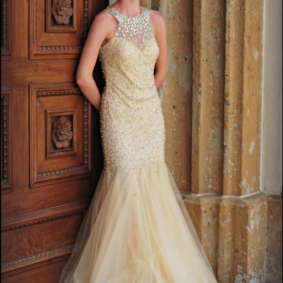 Backless cream jeweled prom dress