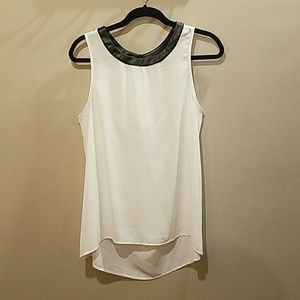 White hi-low sleeveless blouse w/ faux leather