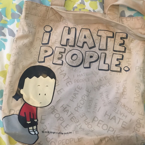 Cream colored over the shoulder bag