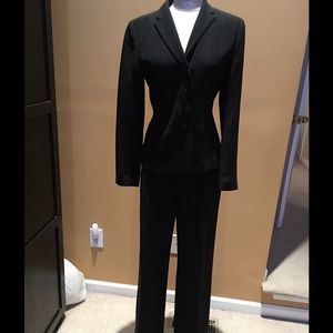 Black pinstriped suit