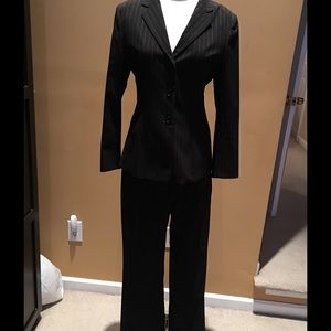 Dark blue pinstriped suit