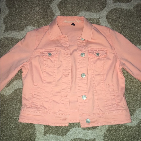 Salmon/peach colored jean jacket