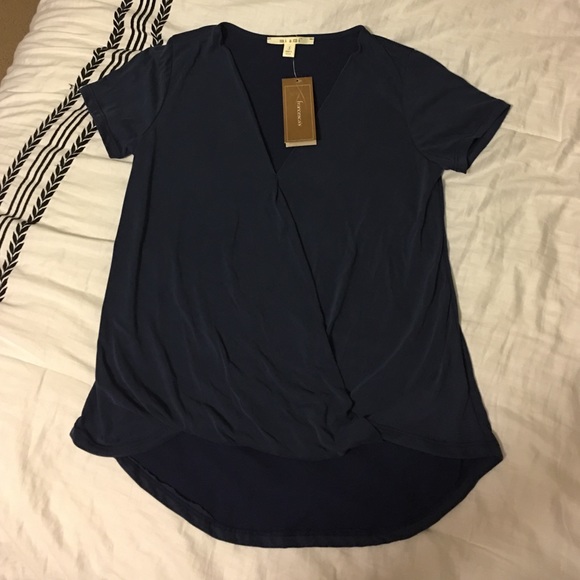 Navy blue, short sleeved top.