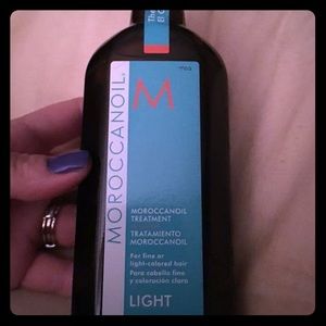 Moroccan oil treatment. 6.8fl oz. Never opened