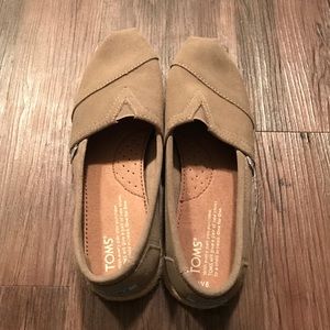 Beige suede Toms slip ons