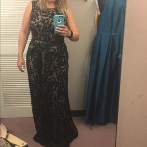 Size 14 formal gown. Black lace over nude coloring