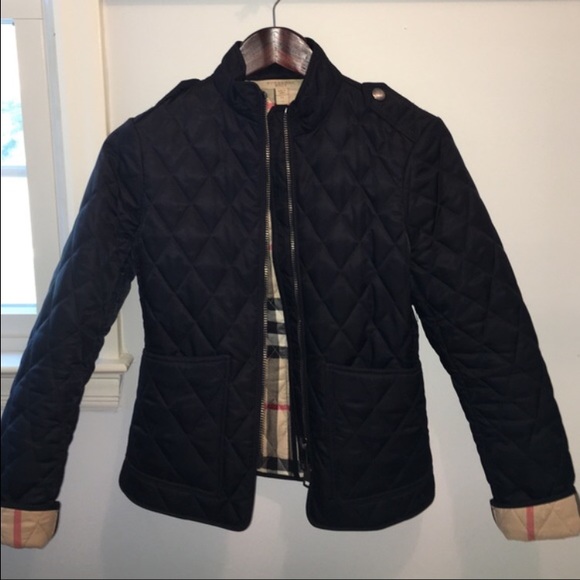 Navy Burberry jacket.