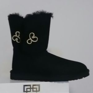 Ugg gold hook & eye decrative on side