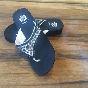 Yellow box flip flops