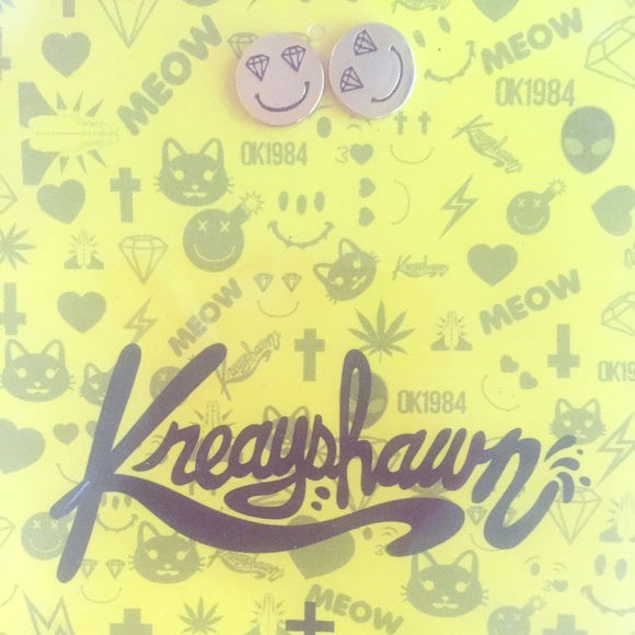Kreayshawn earrings.